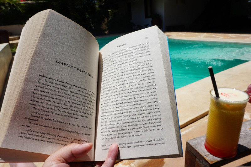 Reading by the pool, Zanzibar, Tanzania